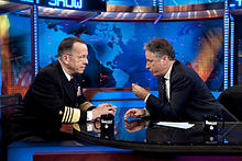 Stewart interviewing Admiral Michael Mullen during a taping session of The Daily Show