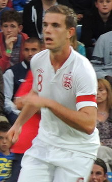 Henderson captaining England U-21 team.
