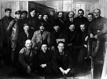 A group of participants in the 8th Congress of the Russian Communist Party, 1919. In the middle are Stalin, Vladimir Lenin, and Mikhail Kalinin.