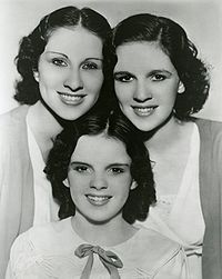 The Gumm Sisters, AKA The Garland Sisters, circa 1935, from left to right: Mary Jane, Frances Ethel (Judy Garland) and Dorothy Virginia Gumm.