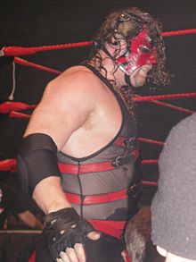 Kane in 2003, wearing his half mask weeks before his unmasking on Raw.