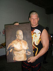 Kane with a portrait during SmackDown/ECW Road to Wrestlemania Tour in 2008.