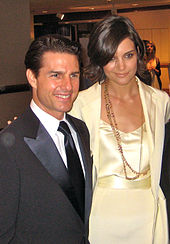 Holmes with Tom Cruise in May 2009