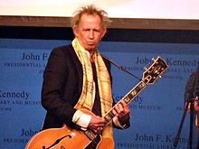 Richards paying tribute to fellow musicians Chuck Berry and Leonard Cohen at the first annual PEN Awards in the JFK Presidential Library in Boston, Massachusetts, 16 February 2012