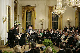 Kenny Chesney performing in the East Room of the White House on May 16, 2006, at the official dinner for Australian Prime Minister John Howard and Mrs. Janette Howard