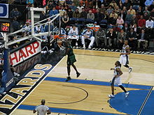 Garnett dunking a ball in a game against the Washington Wizards