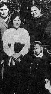 Kim's first wife, Kim Jŏng Suk, and son, Kim Jong-il.