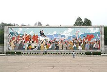 A mural of Kim Il-sung giving a speech in Pyongyang.