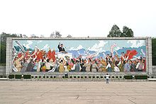 A mural of Kim Il-sung giving a speech in Pyongyang.