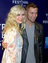 Dunst with Brian Geraghty at the 2010 premiere of Bastard.