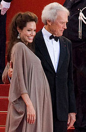A pregnant Jolie with director Clint Eastwood at the Cannes premiere of Changeling in 2008
