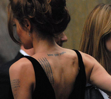 Jolie at the New York premiere of A Mighty Heart in 2007; several of her tattoos are visible