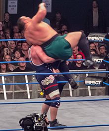 Angle attempts the Olympic Slam on Samoa Joe.