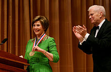 Bush is awarded the Living Legend Medallion from James H. Billington, the Librarian of Congress, for her work in support of the National Book Festival, September 2008.