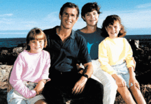 Laura and George W. Bush with their daughters Jenna and Barbara Bush, Kennebunkport, 1990