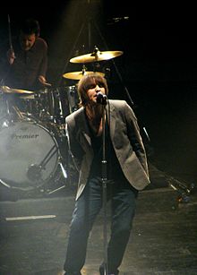 Gallagher performing with Beady Eye