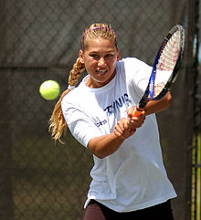 Anna Kournikova practices her backhand for a match at the Family Circle Cup Tennis Tournament on Daniel Island in Charleston, South Carolina.