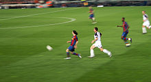Messi in a match against Rangers in 2007