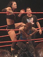 Victoria wrestling against Jacqueline at Raw live event