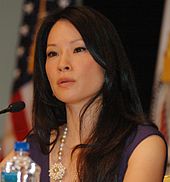 Liu speaking at the USAID Human Trafficking Symposium in September 2009.