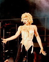 Madonna performing on the Blond Ambition World Tour