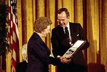 US President George H. W. Bush awards Thatcher the Presidential Medal of Freedom, 1991