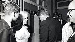 John F. Kennedy (with his back to the camera), Robert Kennedy, and Marilyn Monroe, May 19, 1962