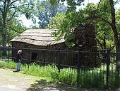 Cabin where Twain wrote "Jumping Frog of Calaveras County," Jackass Hill, Tuolumne County. Click on historical marker and interior view.