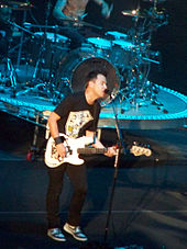 Hoppus performing in Irvine, California on September 18, 2009.