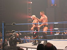 Morgan preparing to hit a reverse chokeslam on Scott Steiner.