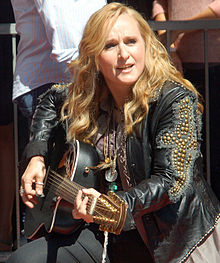 Etheridge performing at a September 2011 ceremony where she received a star on the Hollywood Walk of Fame