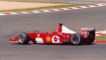 Schumacher driving the Scuderia Ferrari Marlboro F2002 at the 2002 French Grand Prix, the race at which he clinched the 2002 Drivers' Championship, setting the record for the fewest races in locking up the title