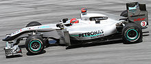 Schumacher practising for the Malaysian Grand Prix from which he retired with a faulty wheel nut