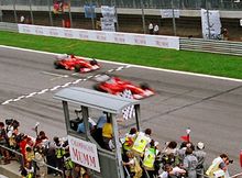 Rubens Barrichello makes way for Schumacher at the end of the 2002 Austrian Grand Prix.