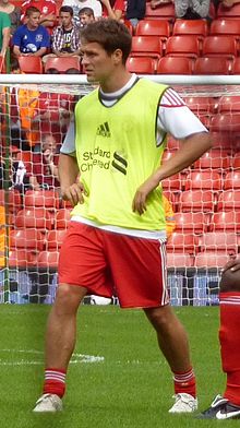 Owen wearing Liverpool shirt before Jamie Carragher Testimonial Match (2010)
