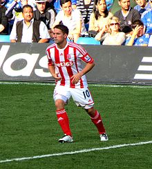 Owen playing for Stoke City in a Premier League match on 22 September 2012 against Chelsea