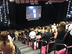 Michael Moore at the 2007 Cannes Film Festival receiving a standing ovation for Sicko