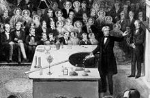 Michael Faraday delivering a Christmas Lecture at the Royal Institution in 1856.