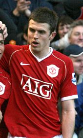 Carrick celebrates a goal in the Manchester derby in a 3–1 home win on 9 December 2006