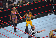 James and Kelly Kelly after a tag team match against Beth Phoenix and Victoria in February 2008.