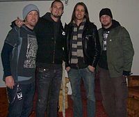Kennedy (right center) with his Alter Bridge band mates in 2008.