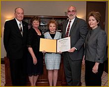Nancy Reagan, center, receives an honorary degree from Eureka College, March 31, 2009