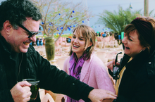 Amos Gitai with Hana Laszlo and Natalie Portman on the set of Free Zone (2005)