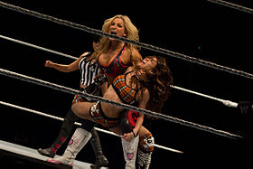 Natalya in action against AJ at a live SmackDown event in January 2012.