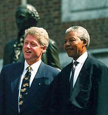 Mandela with US President Bill Clinton. Though publicly criticising him on several occasions, Mandela liked Clinton, and personally supported him during his impeachment proceedings.[240]