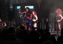 Scherzinger performing "Poison" at the EE launch party. (2012)