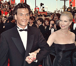 Swayze and his wife, Lisa Niemi, arrive at the 1989 Academy Awards ceremony