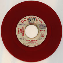 A red vinyl promotional copy of 1966 Simon & Garfunkel single "I Am a Rock"