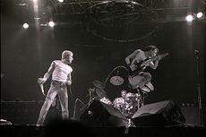 Townshend leaping into air in concert