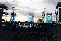 Phil Collins performing at a Genesis concert in Knebworth, England in 1992.